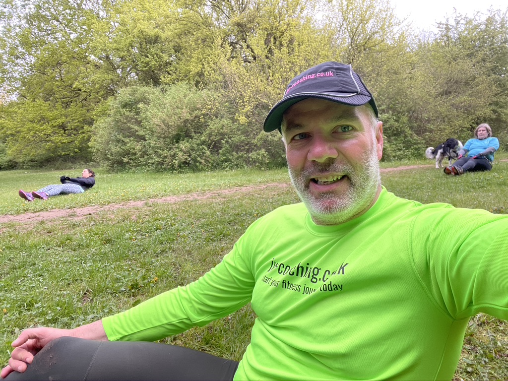 Green long-sleeved jw-c t-shirt and black jw-c cap